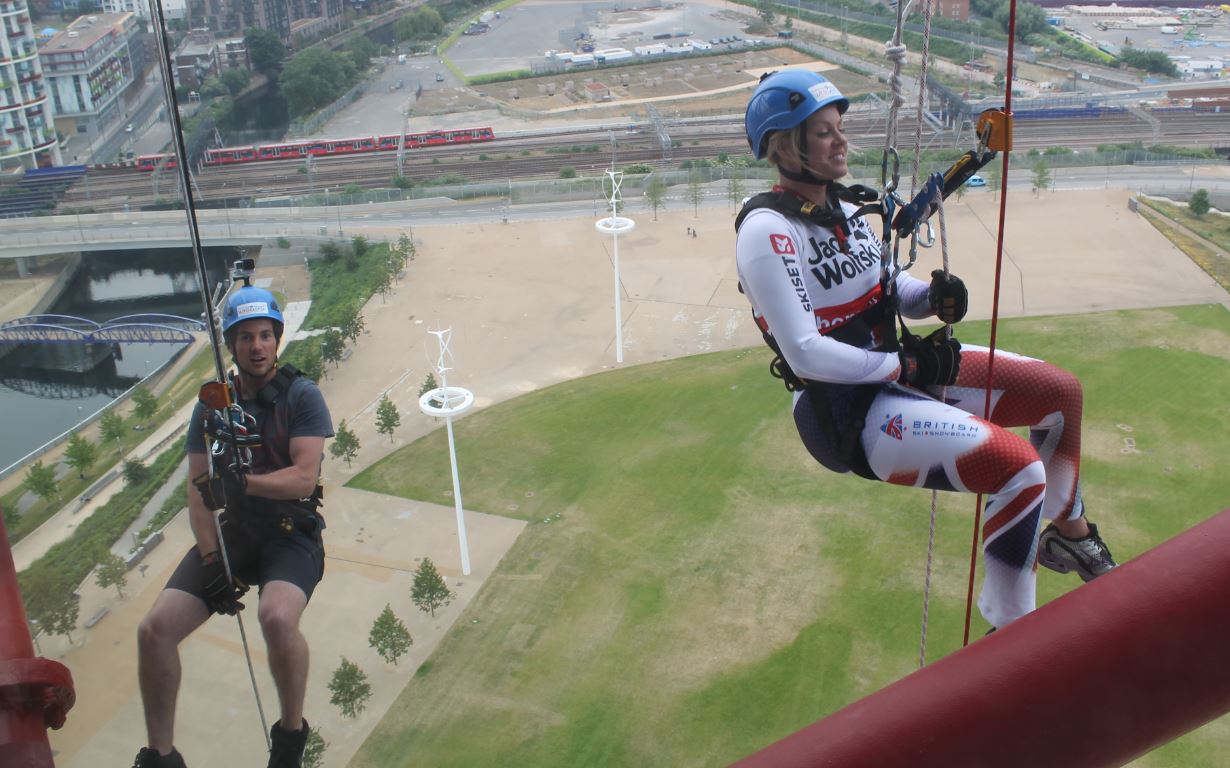 Chemmy and Dougie abseiling