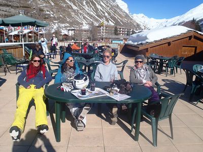 Chalet workers drinking on mountain