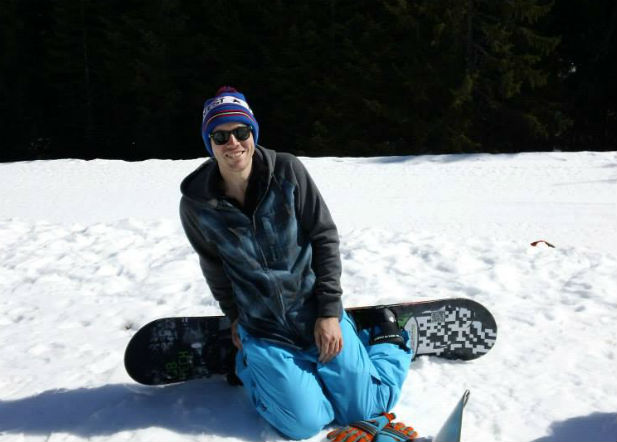 Tom snowboarding