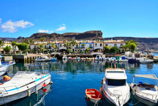 Boats moored in the harbour of the small fishing village of Puerto Mogan, Gran Canaria