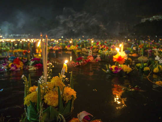 Krathongs (Baskets) float on the water during the Loi Krathong festival in Thailand