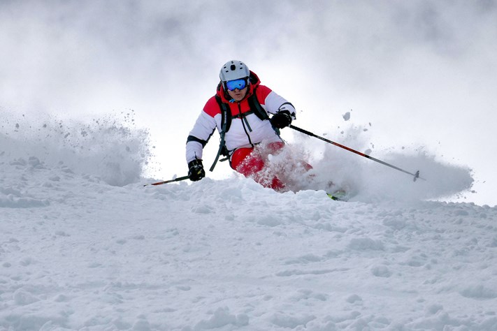 Skier moving through snow