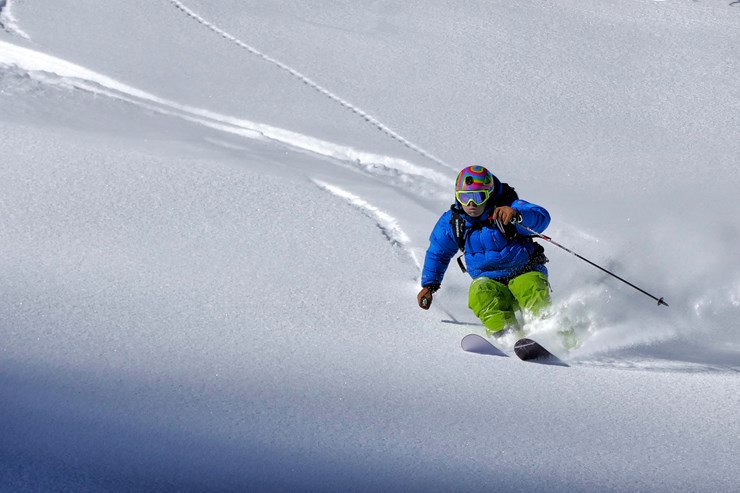 Skier moving through the snow in Italy