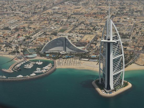 An elevated view of The Burj Al Arab Jumeirah hotel on the beach in Dubai